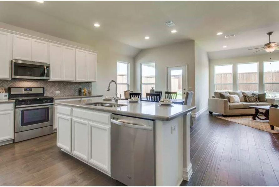 Photo of Pulte model home with same floor plan, not of actual home listed.