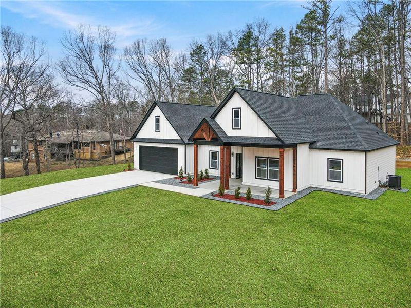 Front exterior of a new home in , Cartersville, GA, highlighting curb appeal (Image 24).