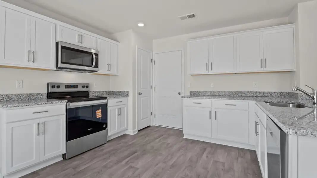 Furnished interior view inside a new home in Jetstream Park, Wilson (Image 8).