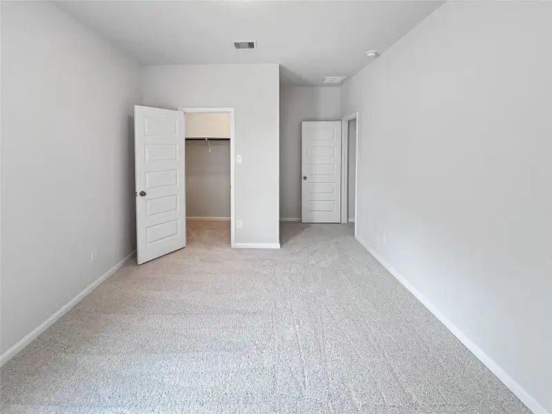 The Caldwell- Bedroom 4. Sample image for illustration; upgrades, options, and colors may vary.