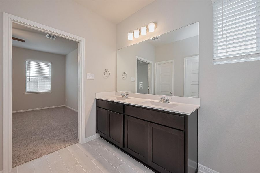 Furnished interior view inside a new home in Enclave at Willis, Willis (Image 7). Furnished interior view inside a new home in Enclave at Willis, Willis (Image 7).