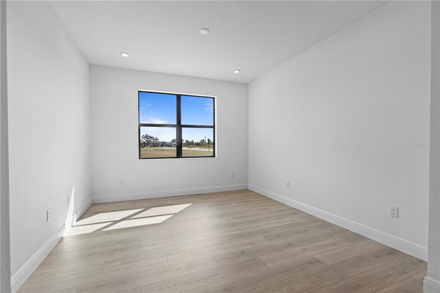 Spacious, unfurnished interior of a new home in Woodland Preserve, Parrish (Image 19).