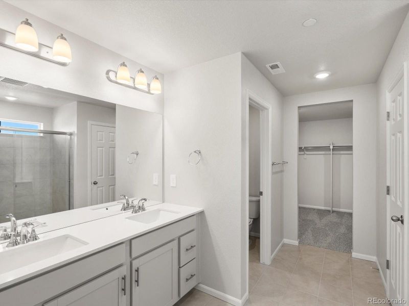 Furnished interior view inside a new home in Buffalo Highlands: The Flora Collection, Commerce City (Image 13).