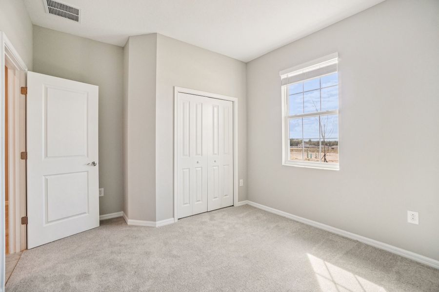 Representative unfurnished interior of a home built from the Juno by William Ryan Homes in Myers Estates, Seffner (Image 24).
