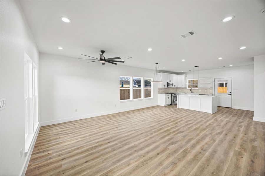 Seamless flow between living, dining, and kitchen areas—ideal for entertaining and everyday living.