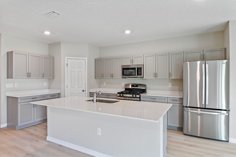 Furnished interior view inside a new home in Pasadena Ridge, Dade City (Image 5).