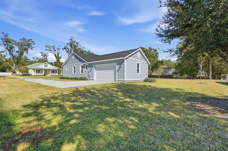 Front exterior of a new home in , Lake Helen, FL, highlighting curb appeal (Image 35).