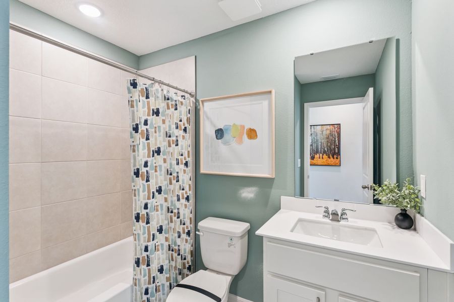 Representative furnished interior of a home built from the Campbell by Hartizen Homes in Connors Cove, Eustis (Image 19).