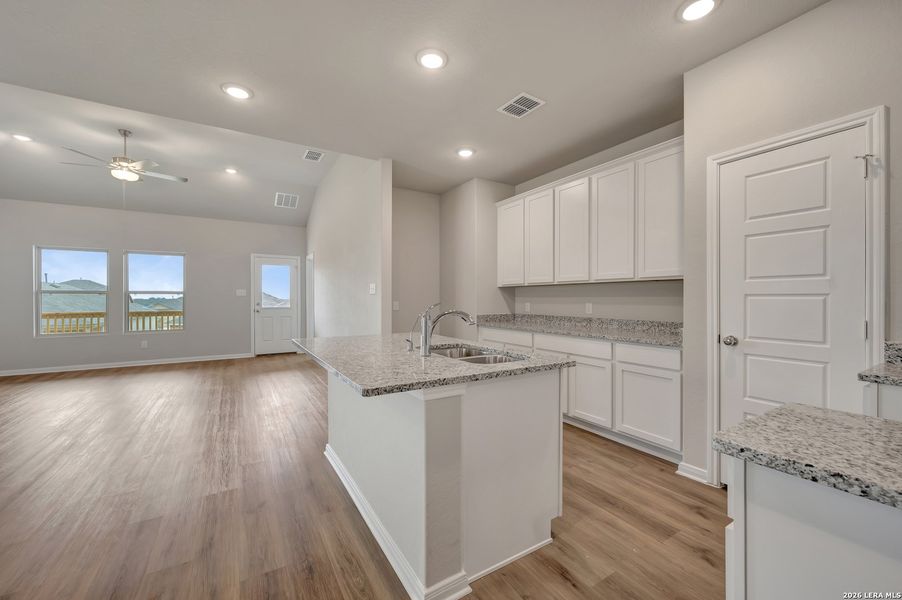 Furnished interior view inside a new home in Hunters Ranch, San Antonio (Image 7).