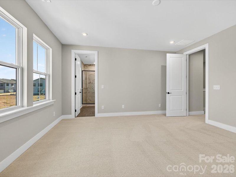 Light filled primary bedroom