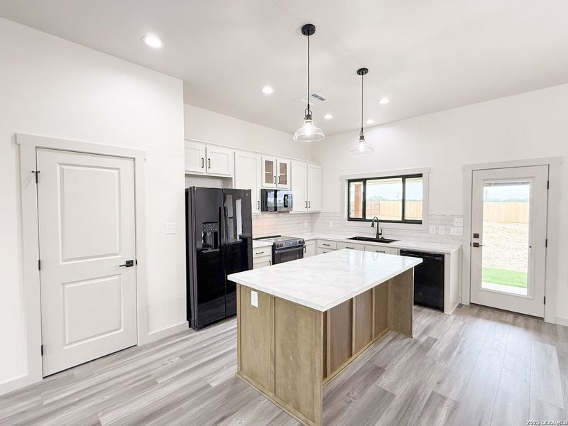 Furnished interior view inside a new home in , Devine (Image 15).