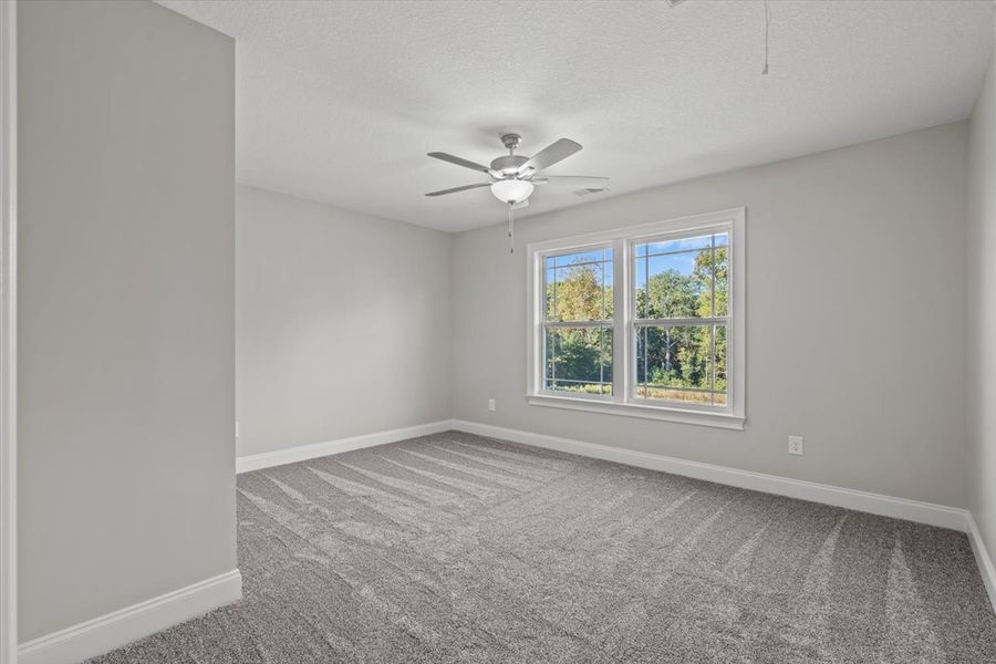 Representative unfurnished interior of a home built from the Enory by Enchanted Homes in Guadalupe Heights, Seguin (Image 34).