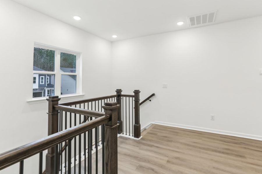 Representative unfurnished interior of a home built from the Alexis by Ashton Woods in Rowland's Grant, Fuquay Varina (Image 43).