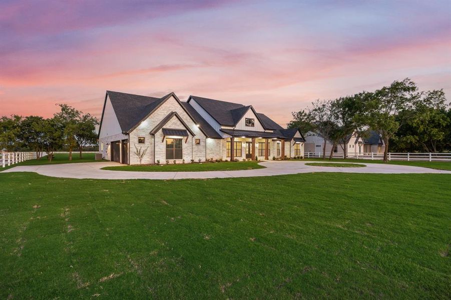 Front exterior of a new home in , McLendon-Chisholm, TX, highlighting curb appeal (Image 24). Front exterior of a new home in , McLendon-Chisholm, TX, highlighting curb appeal (Image 24).