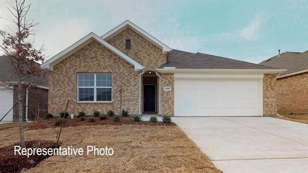 View of front of home with a garage