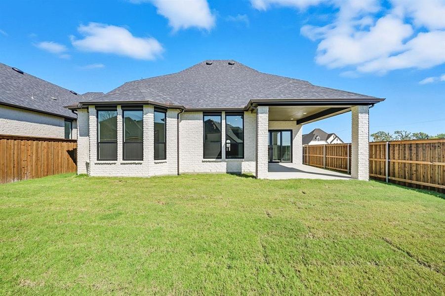 Exterior details and patio area of a home in Trinity Falls, McKinney (Image 1). Exterior details and patio area of a home in Trinity Falls, McKinney (Image 1).