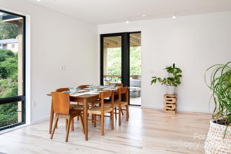 Oversized Doors Lead to Covered Deck Oversized Doors Lead to Covered Deck