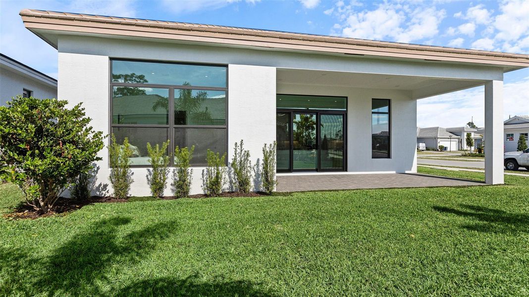 Exterior details and patio area of a home in Cove Royale, Stuart (Image 29).