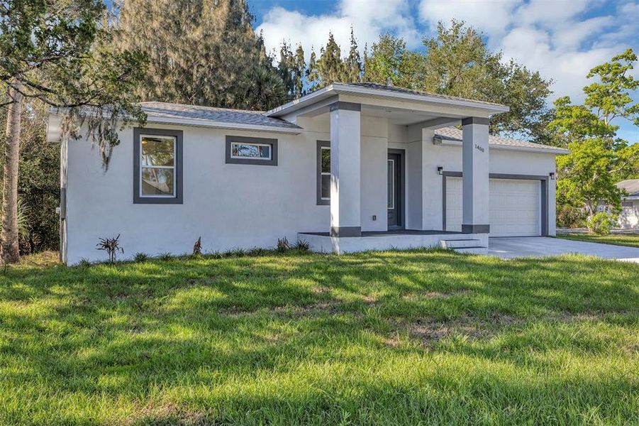Exterior details and patio area of a home in , New Smyrna Beach (Image 20).