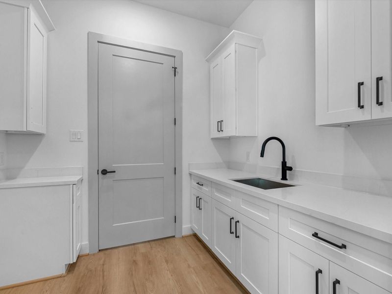 Laundry room is connected to the primary suite