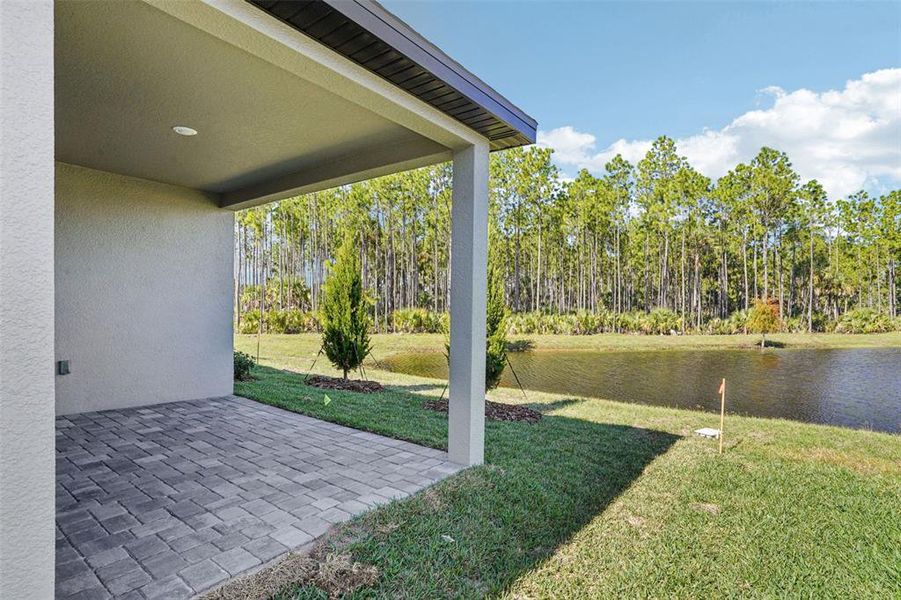 Exterior details and patio area of a home in Ridgehaven - Villas, Ormond Beach (Image 25).