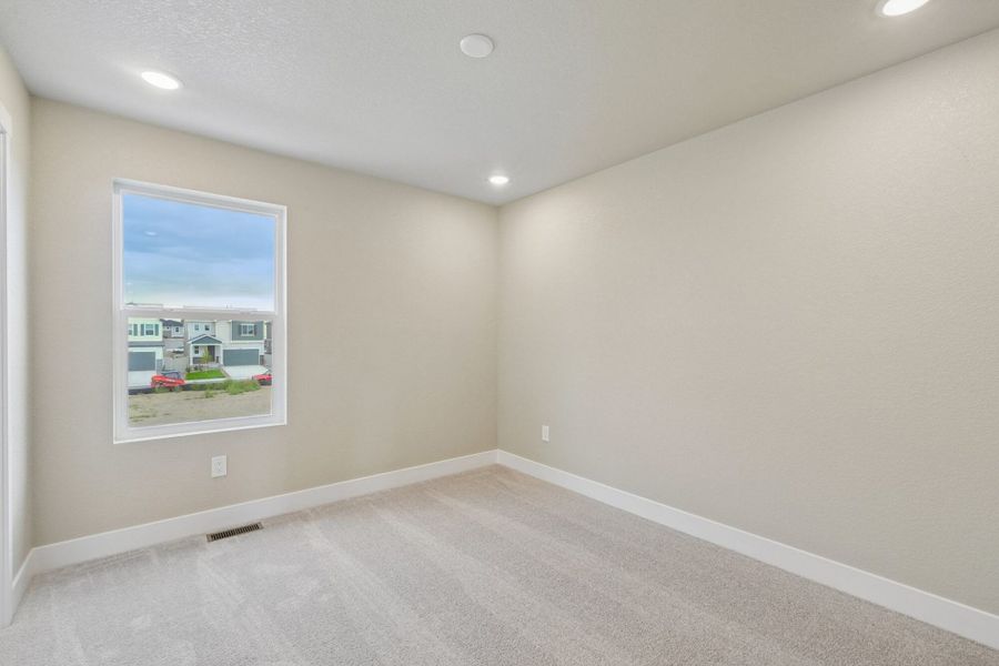 Spacious, unfurnished interior of a new home in The Trails at Aspen Ridge, Colorado Springs (Image 49).