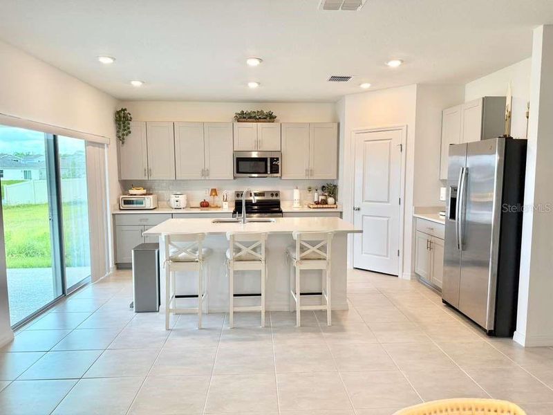 Furnished interior view inside a new home in , Kissimmee (Image 8).