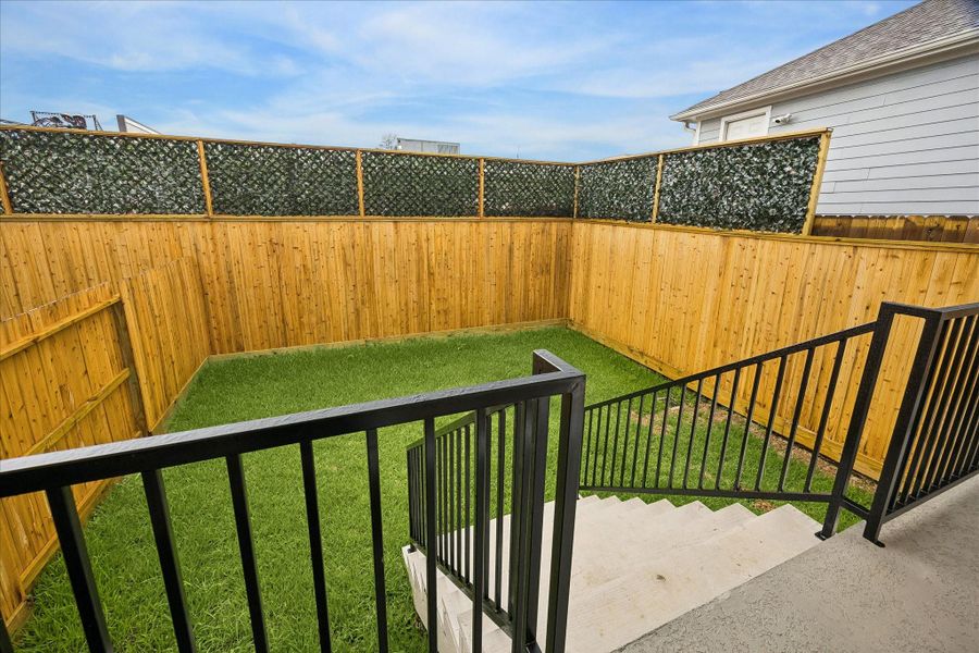 Exterior details and patio area of a home in West 21st Residences, Houston (Image 4).