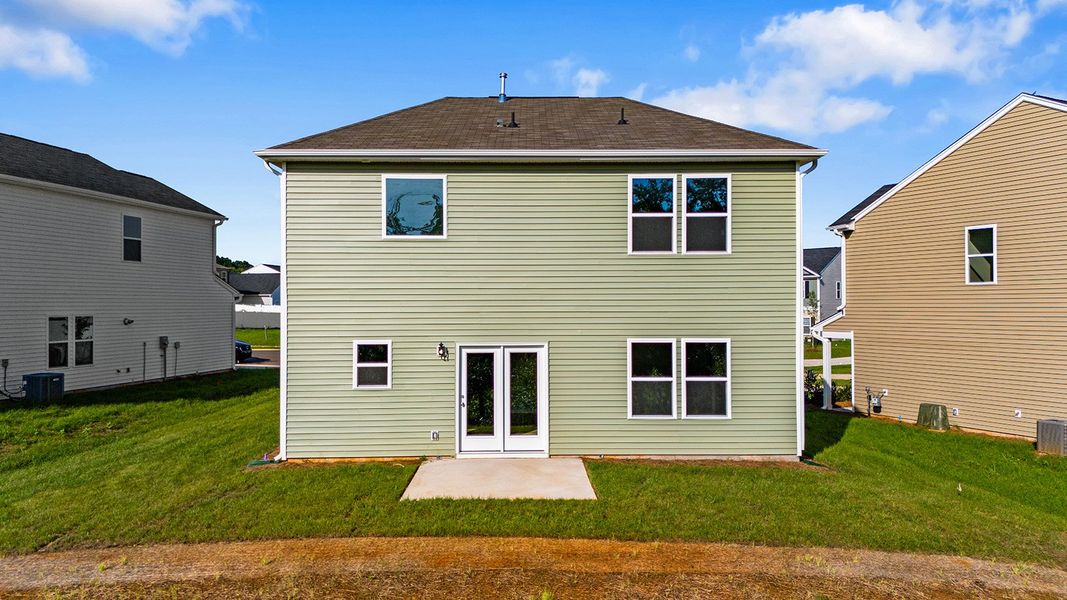 Front exterior of a new home in Bell West, Kernersville, NC, highlighting curb appeal (Image 26).
