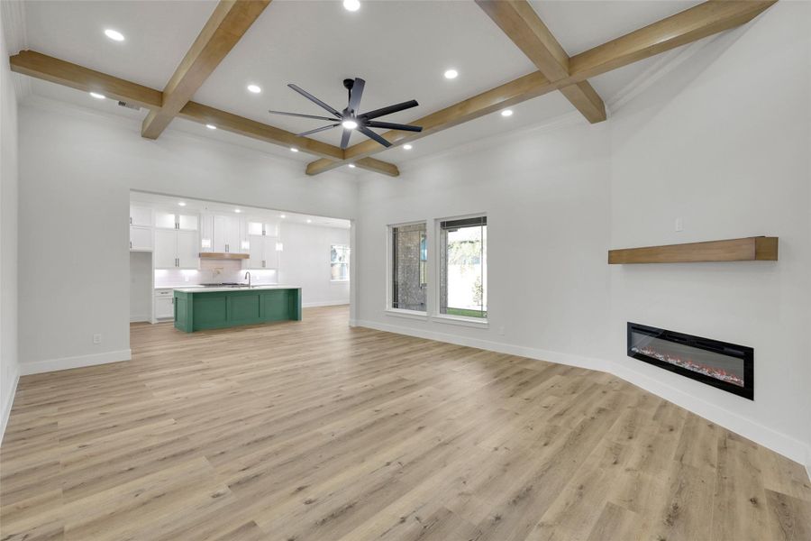 Spacious flow from kitchen to living and dining areas—perfect for entertaining Spacious flow from kitchen to living and dining areas—perfect for entertaining