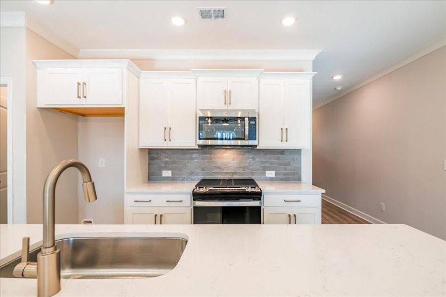 Furnished interior view inside a new home in Bluffs at Bells Ferry, Marietta (Image 11).