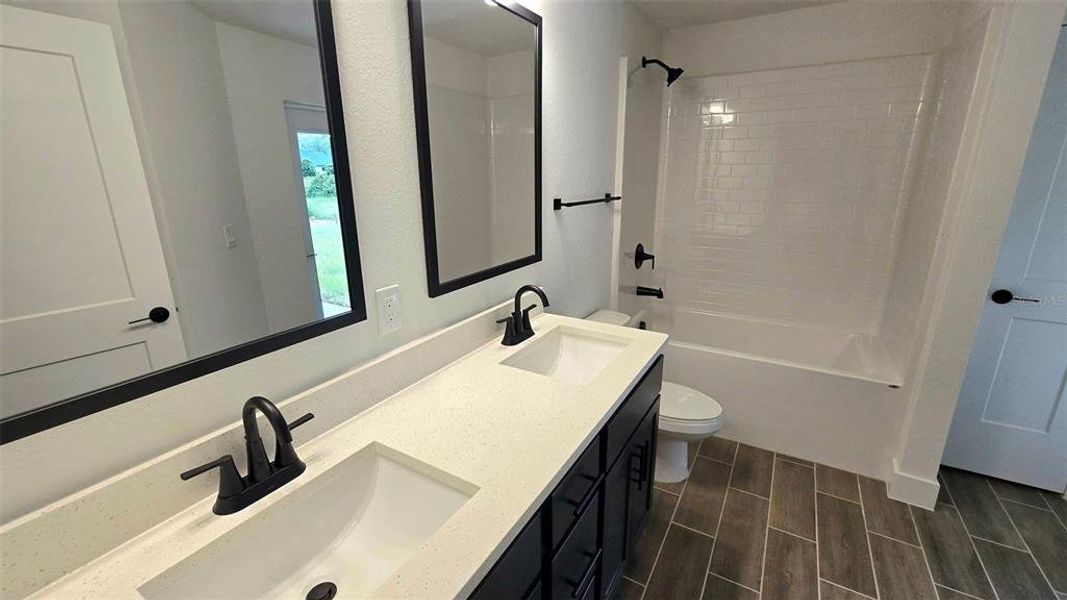 Furnished interior view inside a new home in North Port, North Port (Image 6).