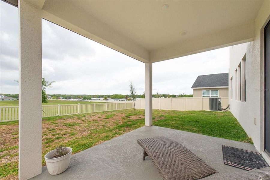 Exterior details and patio area of a home in Hilltop Point, Dade City (Image 26).