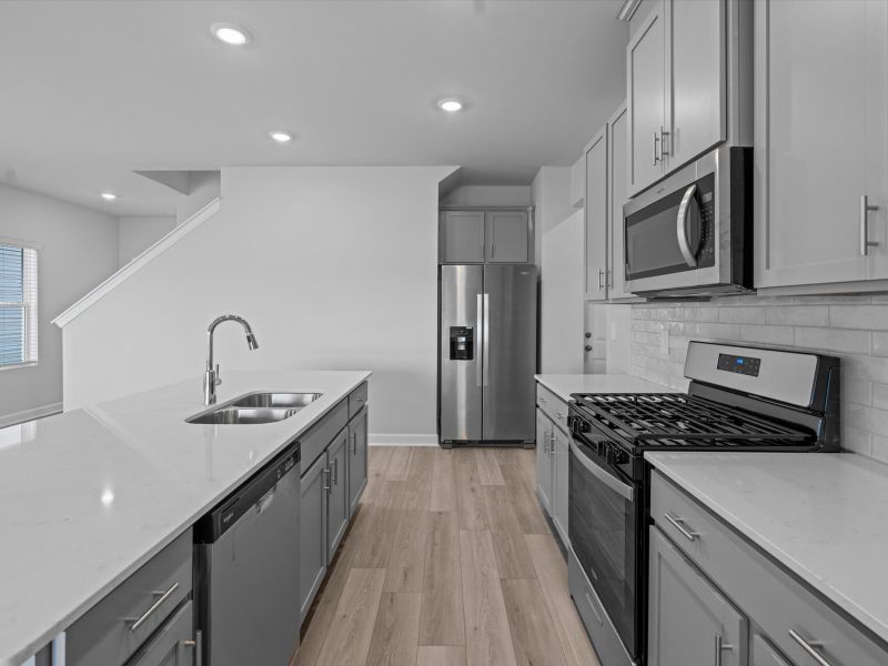 Furnished interior view inside a new home in The Farm at Wells Creek - Heritage Collection, Gray Court (Image 5).