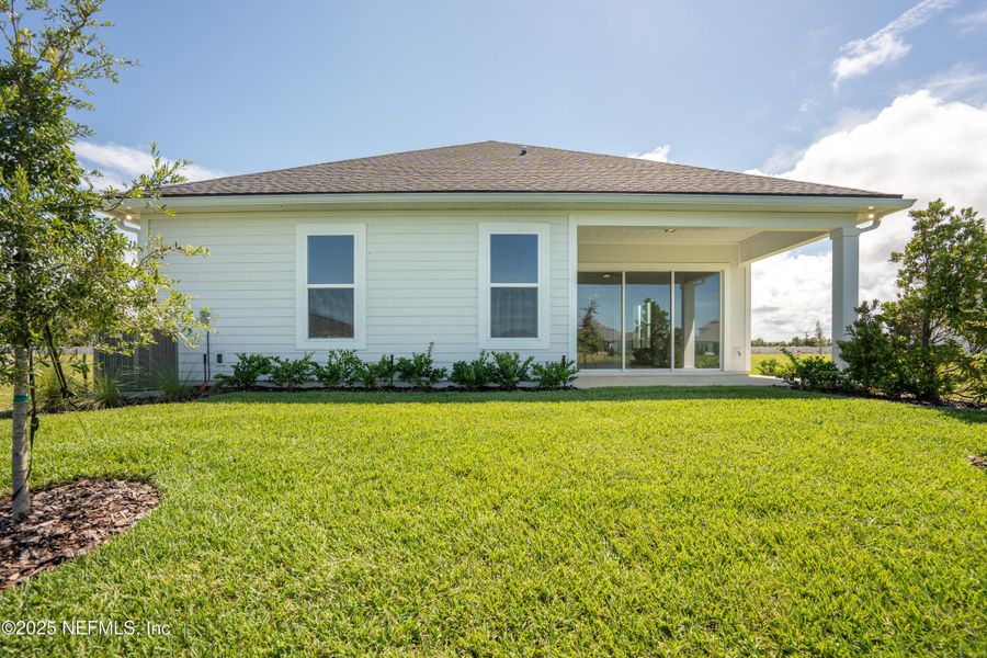 Exterior details and patio area of a home in Madeira, St. Augustine (Image 2). Exterior details and patio area of a home in Madeira, St. Augustine (Image 2).