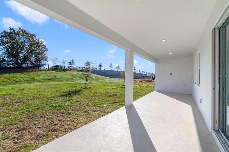 Exterior details and patio area of a home in Vintner Reserve, Clermont (Image 2). Exterior details and patio area of a home in Vintner Reserve, Clermont (Image 2).