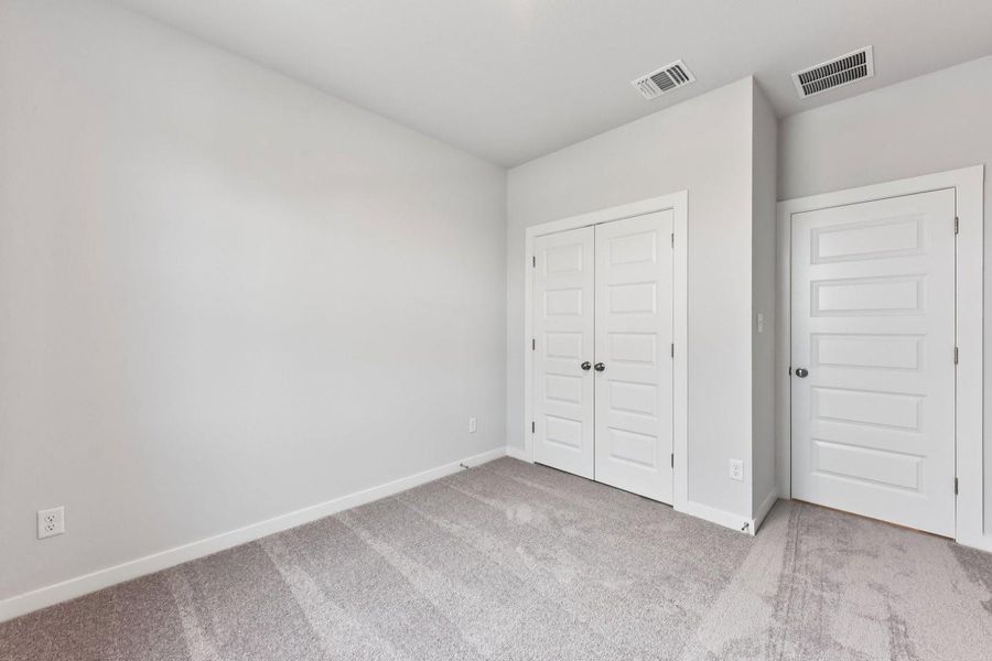 Spacious, unfurnished interior of a new home in Avery Centre, Round Rock (Image 24).
