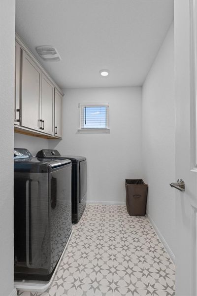 Laundry room with shelving