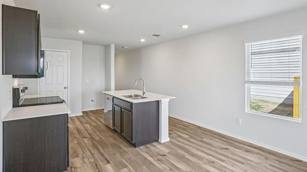 A well-appointed kitchen boasts sleek countertops and modern appliances, perfect for culinary endeavors. A well-appointed kitchen boasts sleek countertops and modern appliances, perfect for culinary endeavors.