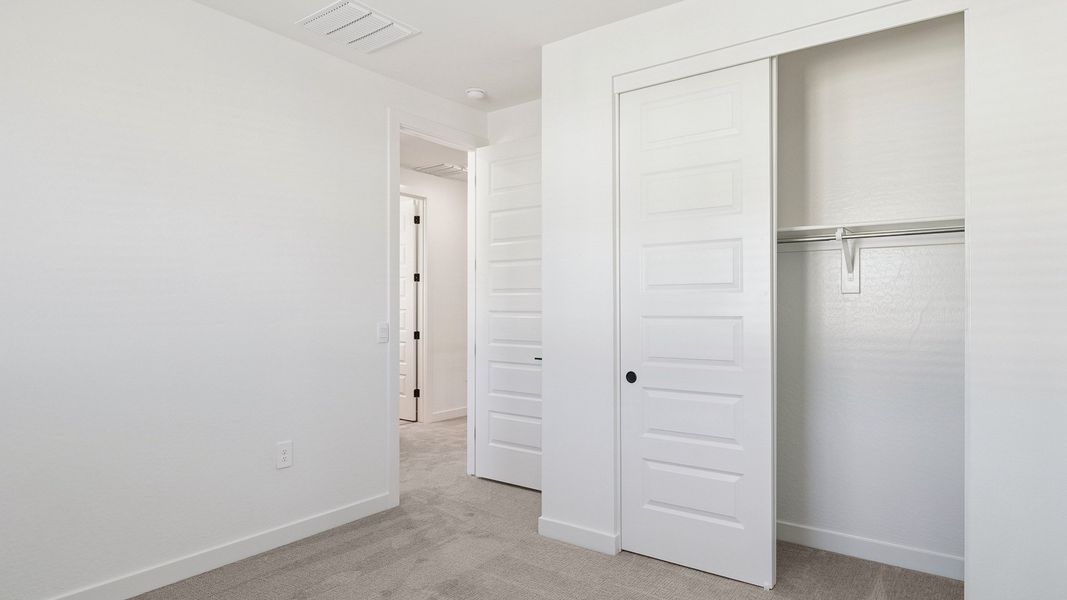 Representative unfurnished interior of a home built from the Crow by D.R. Horton in The Ridge at Stone Butte, Phoenix (Image 41).