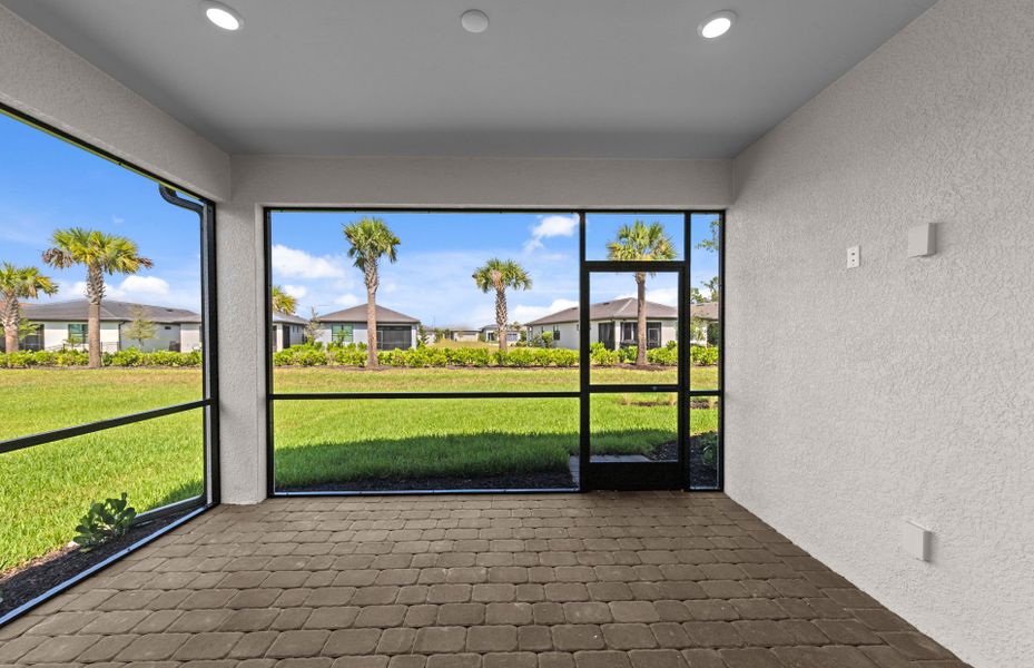 Exterior details and patio area of a home in Arbor Oaks, North Port (Image 3). Exterior details and patio area of a home in Arbor Oaks, North Port (Image 3).