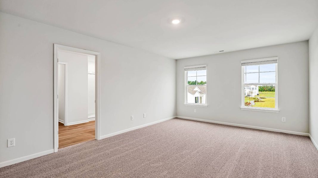 Spacious, unfurnished interior of a new home in Sidbury Station, Castle Hayne (Image 30).