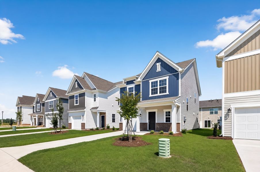 Front exterior of a new home in Taylor Hill, Gilbert, SC, highlighting curb appeal (Image 1). Front exterior of a new home in Taylor Hill, Gilbert, SC, highlighting curb appeal (Image 1).