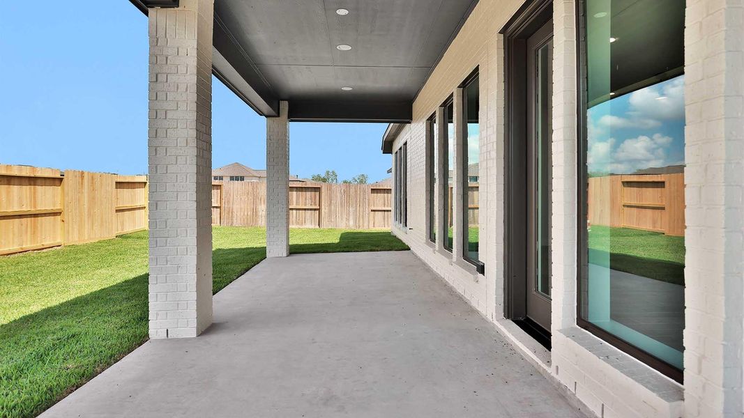 Exterior details and patio area of a home in Sienna, Missouri City (Image 3). Exterior details and patio area of a home in Sienna, Missouri City (Image 3).