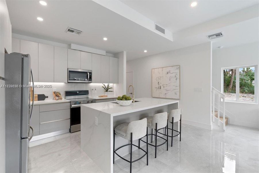 Furnished interior view inside a new home in , Coral Springs (Image 15).