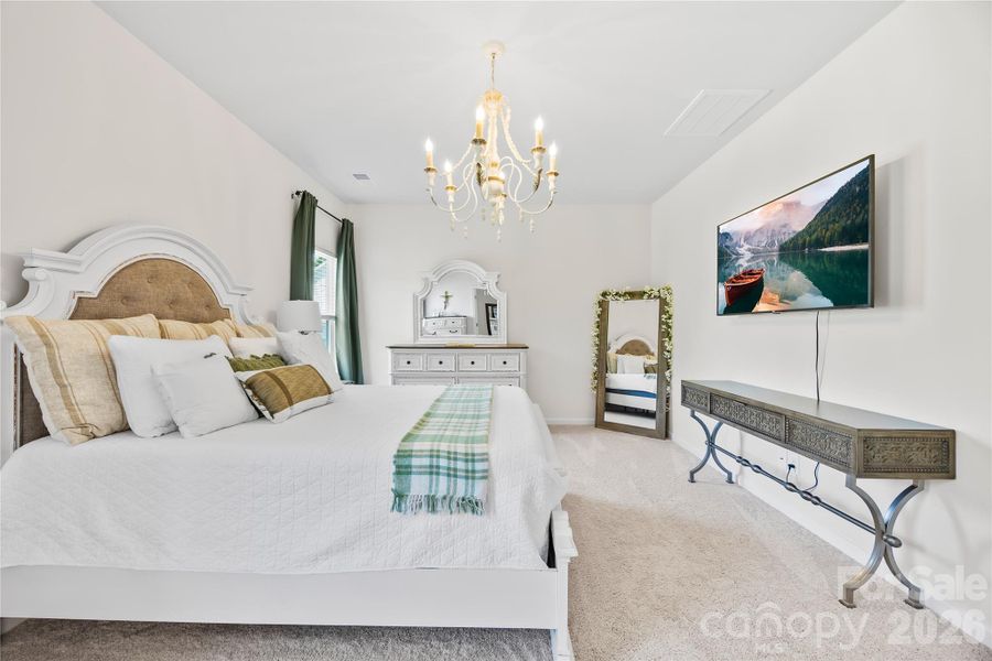 Furnished interior view inside a new home in Orchard Creek, Charlotte (Image 27).