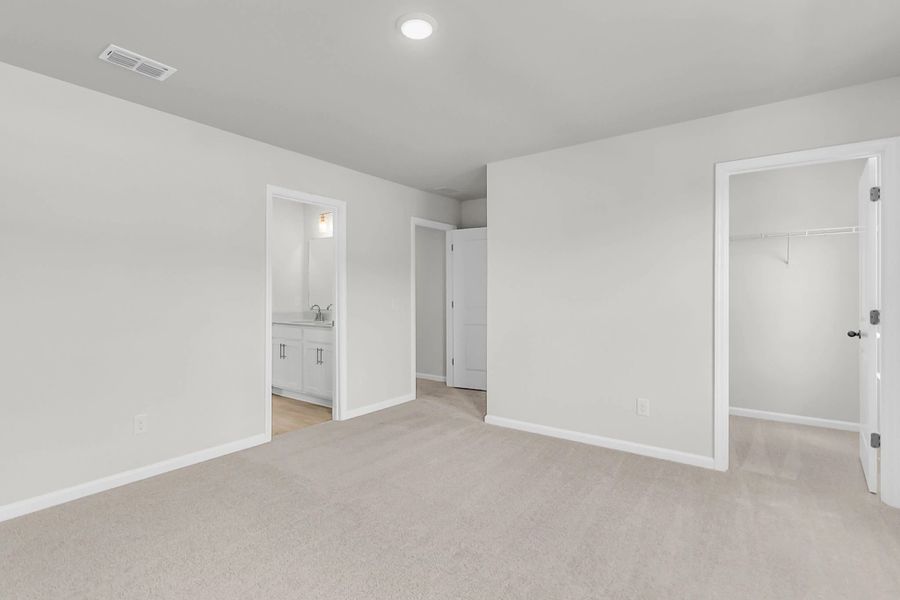Secondary bedroom connects to a Jack-and-Jill bathroom