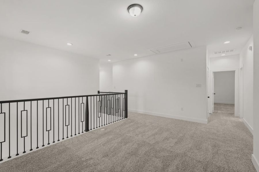Representative unfurnished interior of a home built from the Sorenstam by Chesmar Homes in Riceland Alley Loads, Mont Belvieu (Image 75).