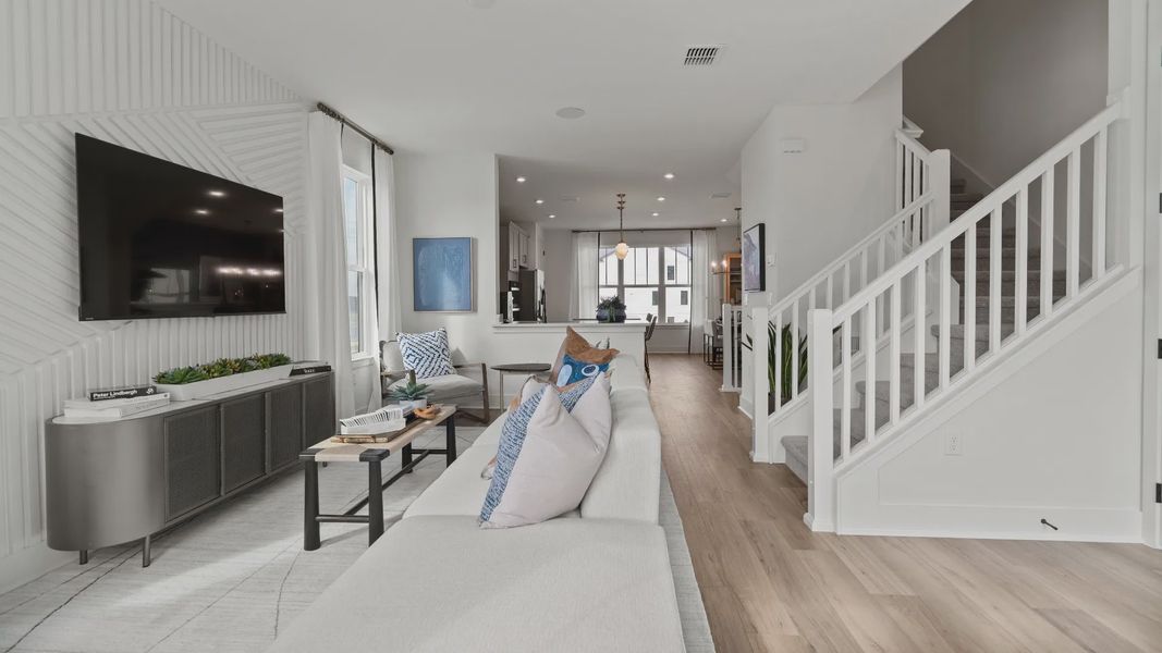 Furnished interior view inside a new home in Parkview at Hamlin, Winter Garden (Image 14).