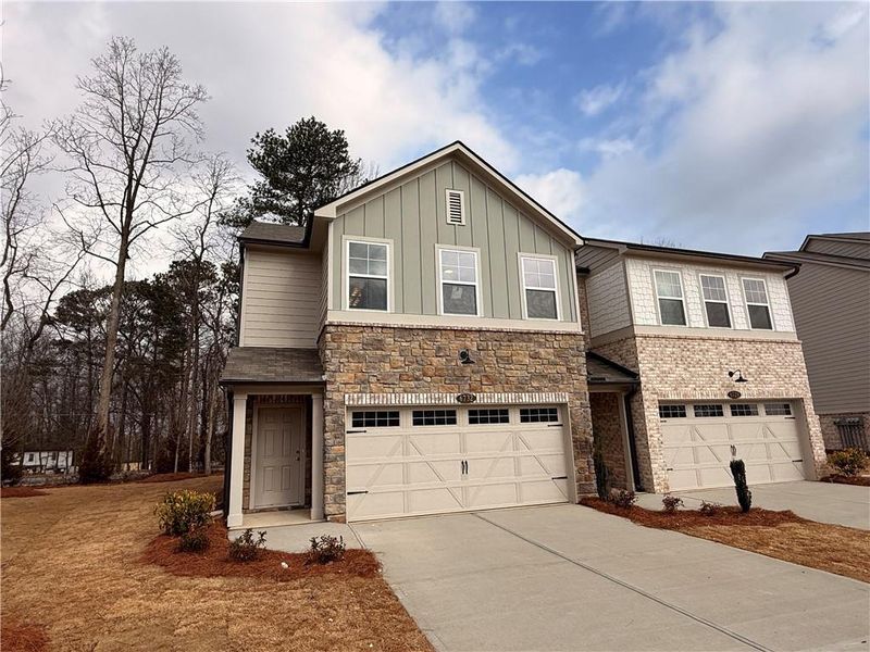 Front exterior of a new home in Leydenview, Mableton, GA, highlighting curb appeal (Image 25).
